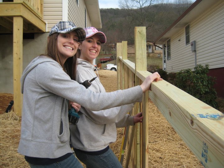 Champlain students, Liz Muroski '11 and Stef Welling '12 attaching pickets to a fence at their work site in Buena Vista, Virginia on their Spring Break 2011 Service Trip with Habitat for Humanity Champlain students, Liz Muroski '11 and Stef Welling '12 attaching pickets to a fence at their work site in Buena Vista, Virginia on their Spring Break 2011 Service Trip with Habitat for Humanity