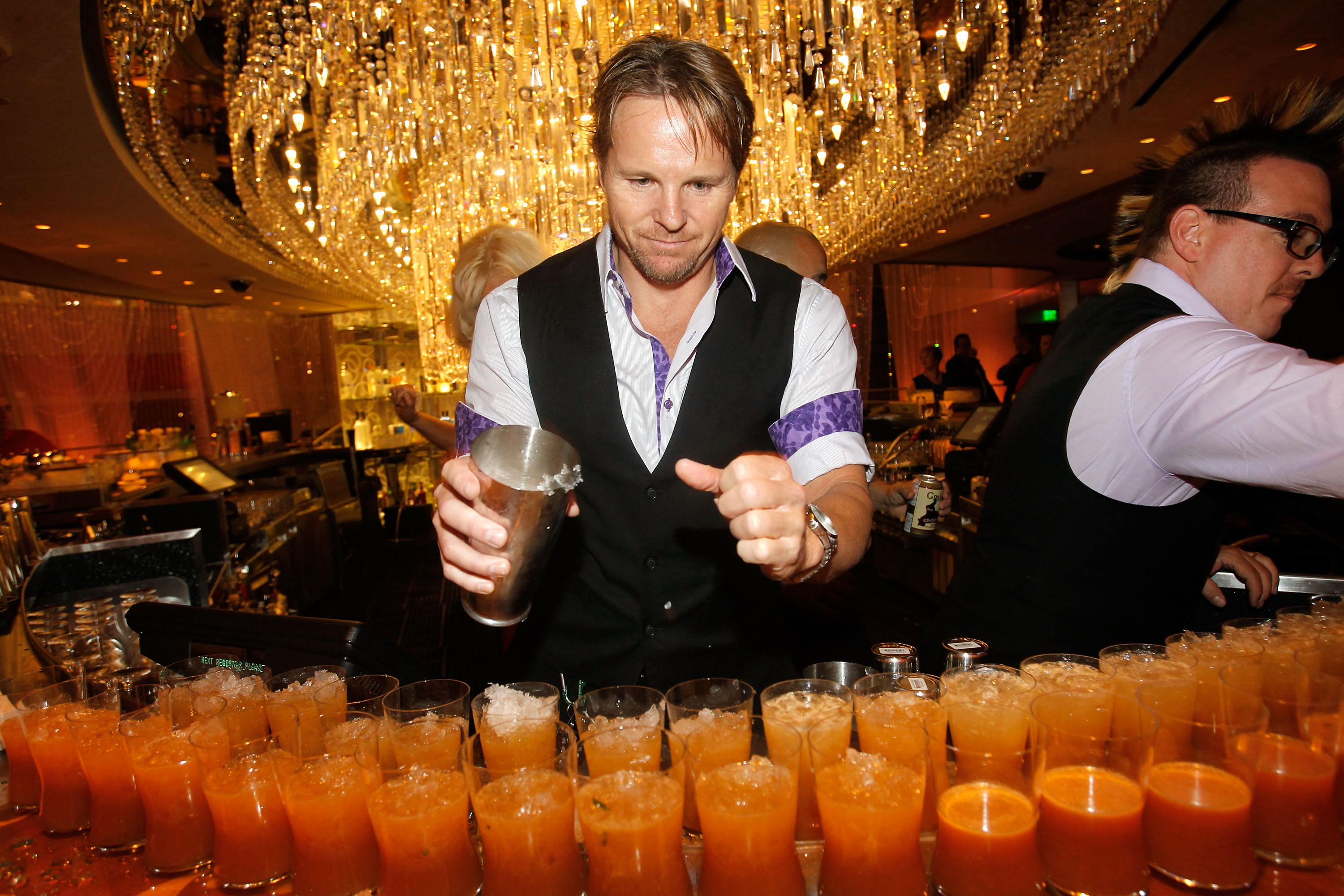 The Cosmopolitan of Las Vegas mixologist serving signature drinks at Uptown/Downtown (photo credit: Isaac Brekken) The Cosmopolitan of Las Vegas mixologist serving signature drinks at Uptown/Downtown (photo credit: Isaac Brekken)