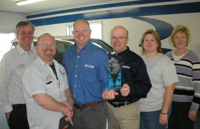 M.C. Mobility Systems Dayton team with their customer satisfaction award M.C. Mobility Systems Dayton team with their customer satisfaction award