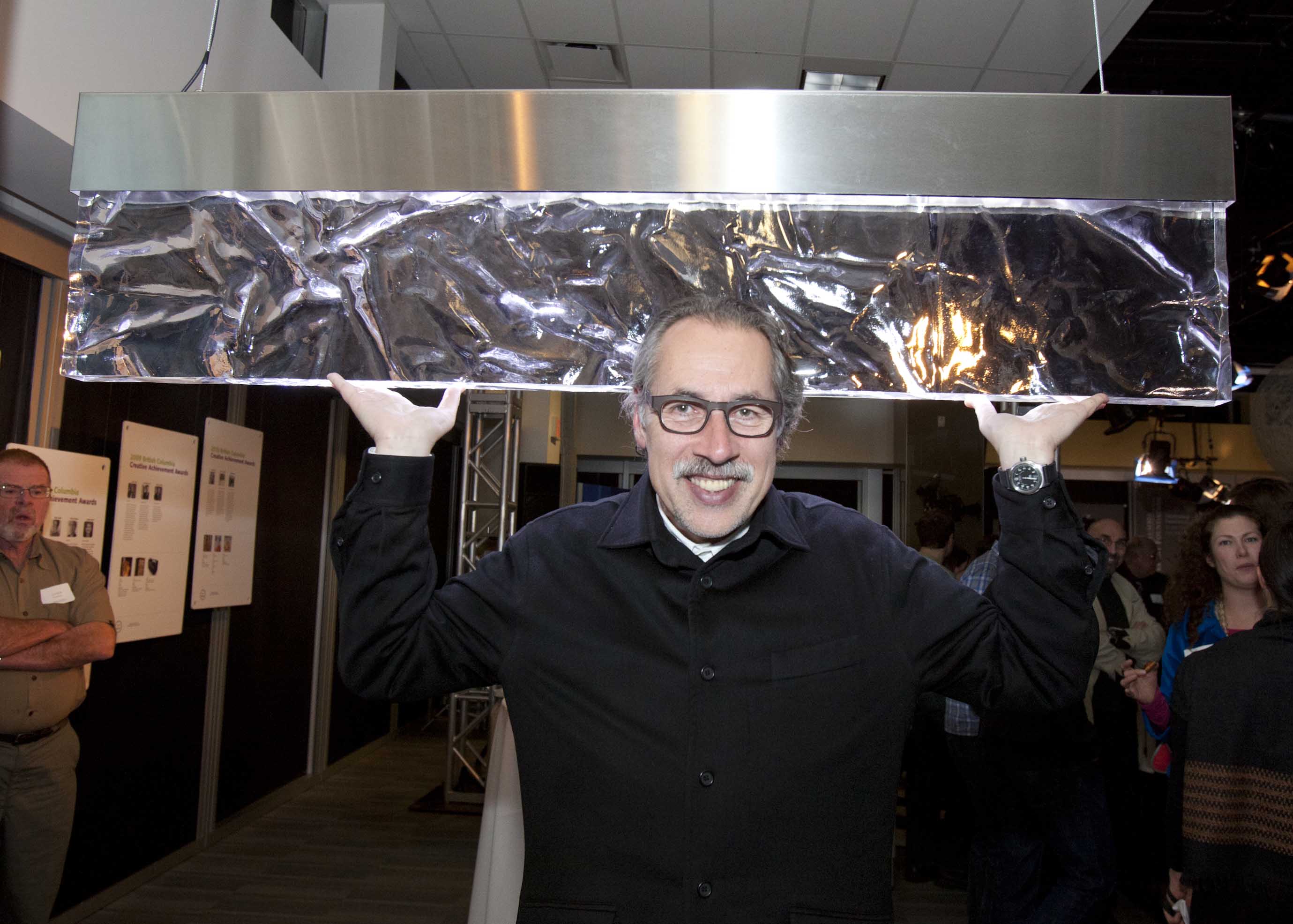 Joel Berman, shown here with his award-winning Heat light sculpture, received the Carter Wosk British Columbia Creative Achievement Award for Applied Art & Design Joel Berman, shown here with his award-winning Heat light sculpture, received the Carter Wosk British Columbia Creative Achievement Award for Applied Art & Design