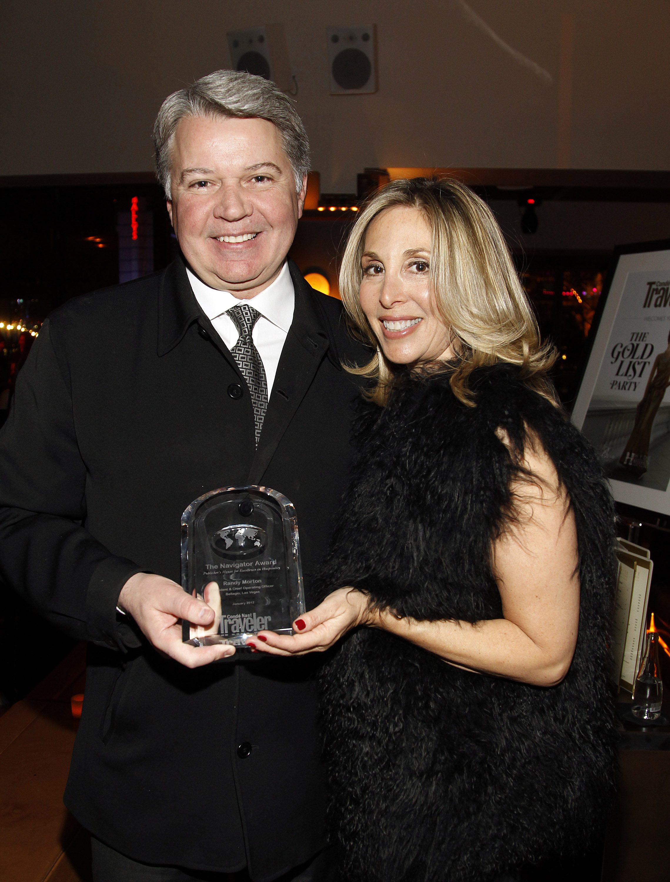 Bellagio President & COO Randy Morton accepts Navigator Award from Conde Nast Traveler Vice President and Publisher Carolyn Kremins on January 21, 2012. Bellagio President & COO Randy Morton accepts Navigator Award from Conde Nast Traveler Vice President and Publisher Carolyn Kremins on January 21, 2012.