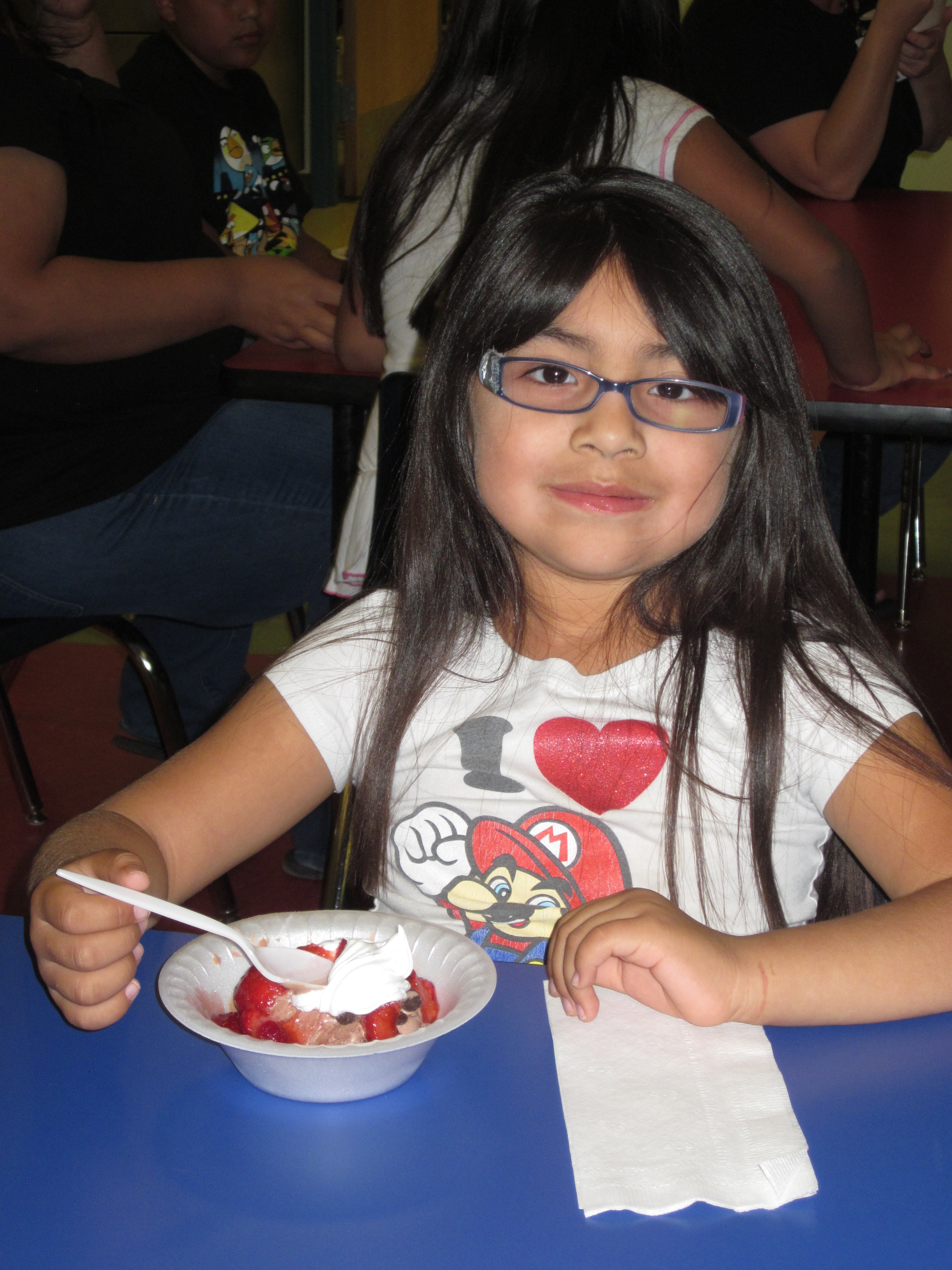 Araya Pena enjoys her personalized Ice Cream Sundae, at the Ak-Chin Child Development's Ice Cream social, which was held to Celebrate The Week of the Young Child. Araya Pena enjoys her personalized Ice Cream Sundae, at the Ak-Chin Child Development's Ice Cream social, which was held to Celebrate The Week of the Young Child.