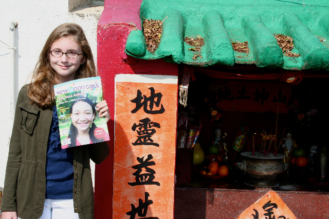 Lila with her New Moon Girls magazine in Hong Kong Lila with her New Moon Girls magazine in Hong Kong