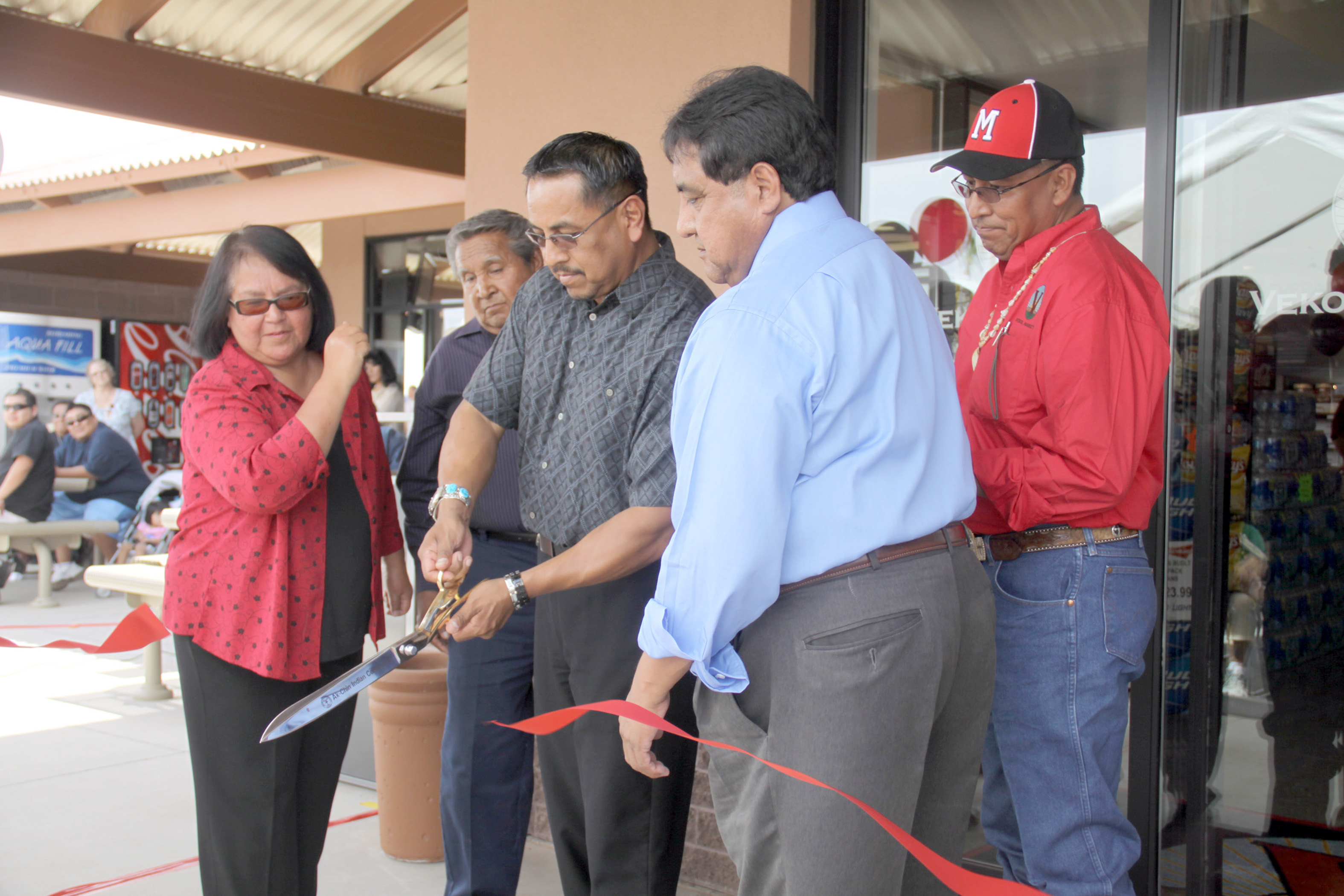 The Ak-Chin Tribal Council cutting the ribbon at the Vekol Market grand opening. From left: Delia M. Carlyle, Terry Enos, Chairman Louis Manuel Jr., Vice Chairman William J. Antone and Gabriel L. Lopez The Ak-Chin Tribal Council cutting the ribbon at the Vekol Market grand opening. From left: Delia M. Carlyle, Terry Enos, Chairman Louis Manuel Jr., Vice Chairman William J. Antone and Gabriel L. Lopez